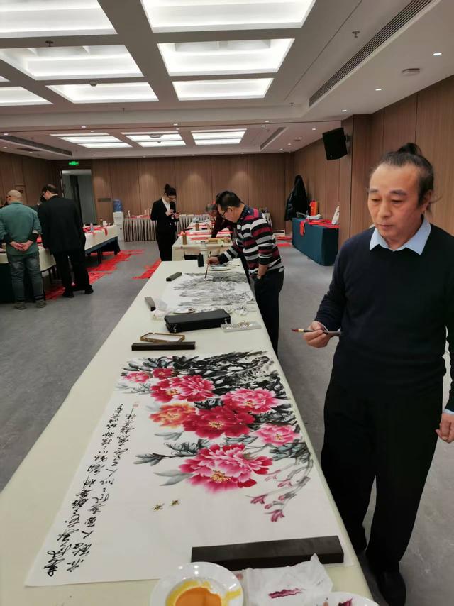 迎新春、写春联	、送祝福”主题活动在北京河南大厦举行