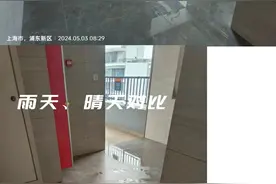 新入住的房子就发生电梯井进水、连廊积水，还要铺沙袋，谁来解决这个问题？图片