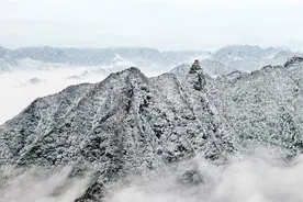 210国道秦岭山区段降雪 西安雨雪降温吹风天气还将持续图片