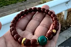 谁能拒绝一条核尖手串—橄榄核切下的美丽图片