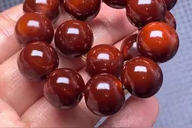 盘玩十来年的橄榄核，包浆玉化很漂亮，光珠适合女生佩戴图片