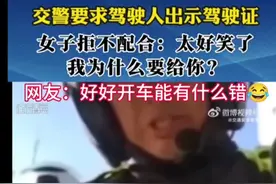 女司机不配合交警执法，车被拖走了，为自己的固执付出代价。图片