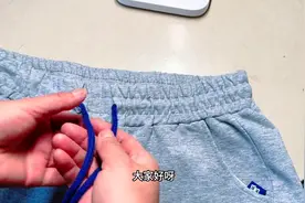 原来裤子上的2根绳子，要这样系才正确，我也刚刚才知道长...图片