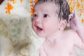 婴儿一出生就睁开眼睛，双眼皮大眼睛，又萌又可爱视频封面