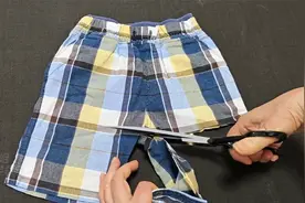 孩子不穿的短裤，剪下裤腿裁个圆缝一缝，省钱实用出门真方便！