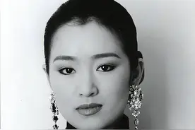 陪马克龙访华的巩俐，“野心”全在脸上，早已走上另一条大道图片