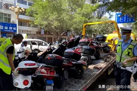 遇上电动车被扣怎么办？本文教你如何用法律保护自己。图片