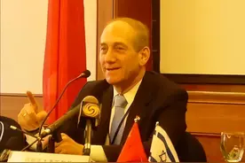 奥尔默特：以色列前总理，对中国情有独钟，自称“半个哈尔滨人”图片