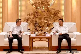段毅君会见省商投城乡建设集团董事长何军图片