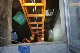 杭州女子踩空木板，掉进六米深的大楼蓄水池图片