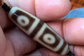 藏传四眼天珠的来历和寓意，看完就了解图片