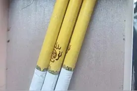 九五至尊香烟烟嘴夹杂毛发 烟草局可免费检测验真伪图片