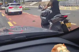 危险！危险！海口市区不少摩托车上路行驶，交警：市中心城区“禁摩”，将依法严查图片