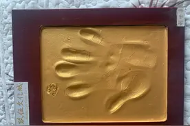 从一块手印牌说起图片