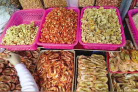 临近春节，海口海鲜市场人头攒动，今年海鲜价格怎么样？哪些干货最受欢迎？图片