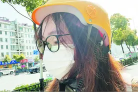 共享助力车配“头盔”，好不好戴？图片