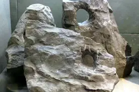 2000年，河南1村庄发现很多石头，上面都带小孔，村民不知有啥用图片