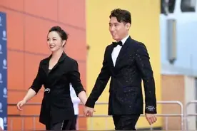 罗海琼到底是华谊老板娘，穿西装配浓妆优雅高贵，阔太气质藏不住图片