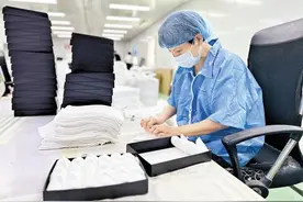 小毛巾怎样“飞”上天图片