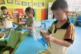 阳信县洋湖乡鹁鸽李学校附属幼儿园：端午节食育课堂《粽子香》图片