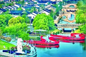 那条江，让它分了南北 这条“路”，使它浑为“一体”图片