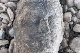 钓鱼人在河道发现佛头 龙门石窟研究院：是否属于文物待专家鉴定图片