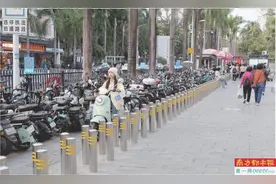 让电动自行车有路走、有地停、有电充图片