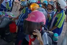 潮评丨戴不戴头盔，该由学校管吗？图片