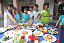 锅碗瓢盆显身手！桂林多所小学劳动技能大赛庆“五一”图片