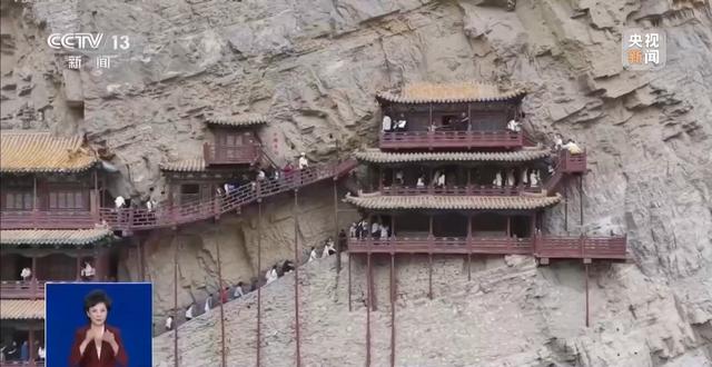 央视曝光悬空寺景区乱象：游客凌晨5点排队买不到票，黄牛却能买到，黑车司机非法揽客
