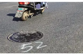 桂林一些道路井盖旁为何都被写上数字？管理部门回应→图片