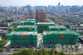 杭州第一个自主更新小区成功结顶图片