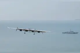 无人机带两箱热带水果飞跃海峡！19分钟快递到手图片