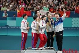 “莎头组合”力克“黑马” 夺得乒乓球混双金牌图片