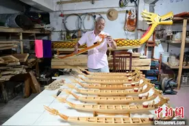 “龙船疯子”指尖上的乡愁与新生图片