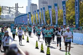 新闻分析：“马拉松热”背后的经济账图片