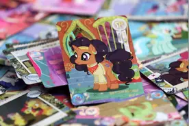 孩子之间流行的卡牌评级后能卖21万？机构回应：系客服道听途说图片