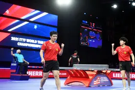 乒乓球——世乒赛：樊振东/王楚钦晋级男双八强图片