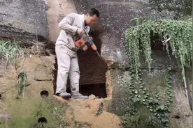 百万粉丝网红“石壁凿豪宅”被指涉嫌违建 调查：打工买不起房凿石造屋是假 曾被叫停图片