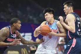 篮球——CBA第三阶段：新疆伊力王酒胜广东东莞大益图片