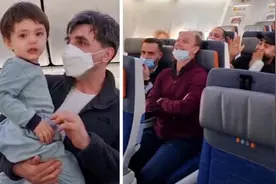 国外一名小男孩在飞机上哭闹 乘客们合唱《鲨鱼宝宝》安抚孩子图片