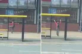 英国一男子等公交时在车站跳舞 大幅舞动超具感染力图片
