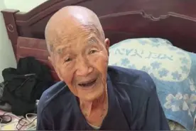 世纪对视！山西一105岁老人与满月玄孙女同框图片