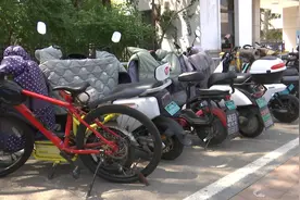 记者调查丨电动车电池可“以换代充”，你会选择使用智能换电柜吗？图片