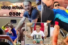 泰国8岁男孩下海游泳时被鲨鱼咬住右腿，拳打鲨鱼头部成功脱身图片