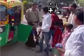 天啊！印度一辆机动三轮车竟载有27名乘客图片