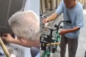 小猫被卡石柱内老人凿开救猫，目击者：他还买了肉给猫吃视频封面