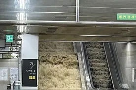 韩国首尔遭遇百年一遇暴雨：地铁进水 1000多辆汽车被淹 多人死亡图片