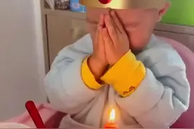 3岁萌娃超认真吹生日蜡烛不料3次都没吹灭图片