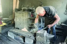勾山街上的“老毛铁店”76岁打铁匠专注打铁近60年图片